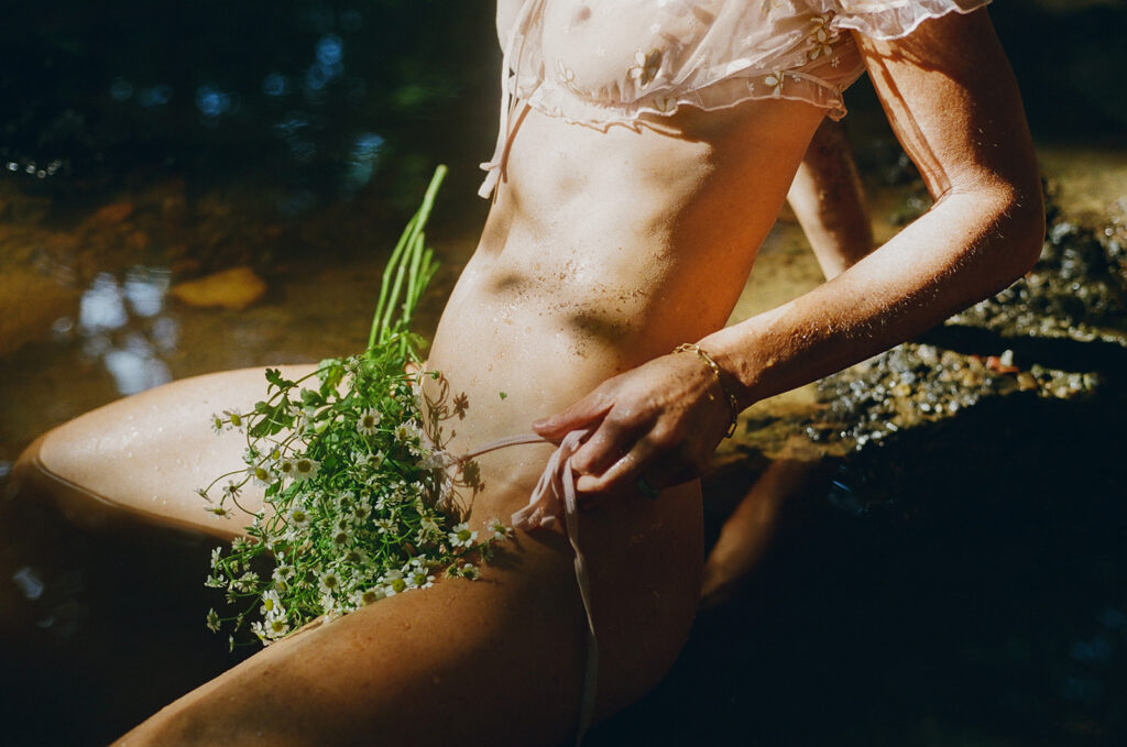 A visual love letter to the divine feminine—soft, strong, sacred. These fine art boudoir portraits were captured using 35mm, 120mm, and Polaroid film to honor the raw, tactile beauty of real moments. Each image holds space for embodiment, rest, and the quiet power of returning home to yourself. Whether you’re navigating motherhood, reclaiming your voice, or simply ready to be seen as you are—this is an invitation.  Photographed by Kristen Hammock, a fine art boudoir photographer in Durham, NC specializing in soulful, film-based storytelling for women ready to embrace their divine feminine.